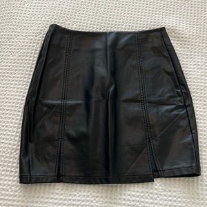 Black leather skirt with mini slits